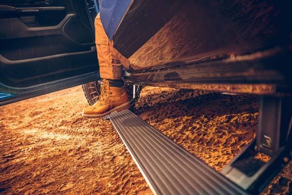 AMP Research 19-22 Ram 1500 All Cabs PowerStep Plug N Play - Black (Incl OEM Illumination)