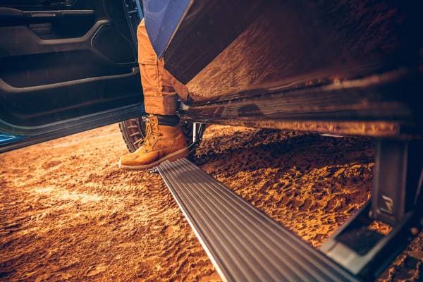 AMP Research 19-22 Ram 1500 All Cabs PowerStep Plug N Play - Black (Incl OEM Illumination)